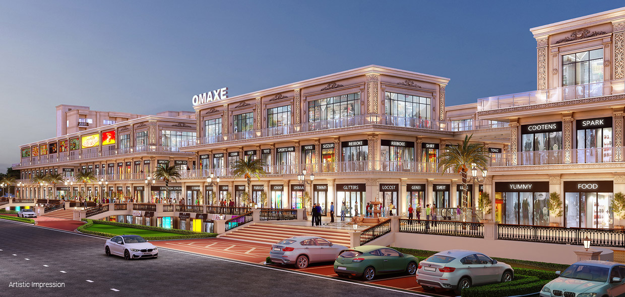 Omaxe Chowk — street-facing retail frontage at dusk, Ludhiana